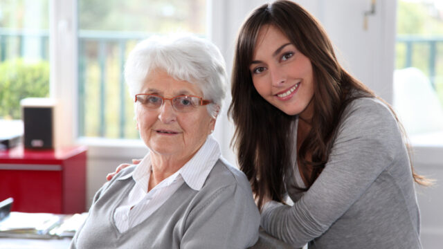 Closeup of elderly woman with young woman